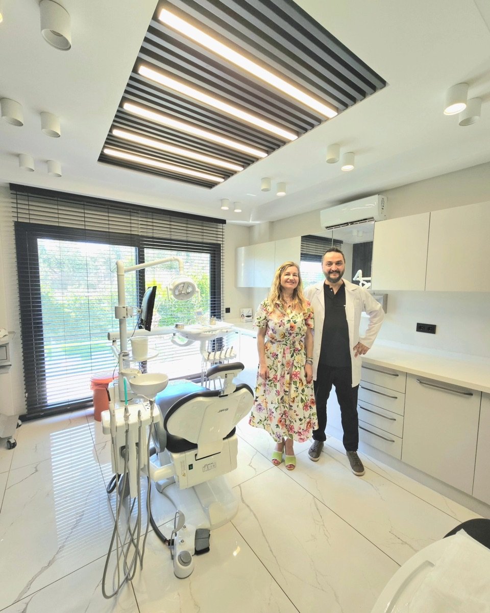 A dentist with a patient at Esteteeth