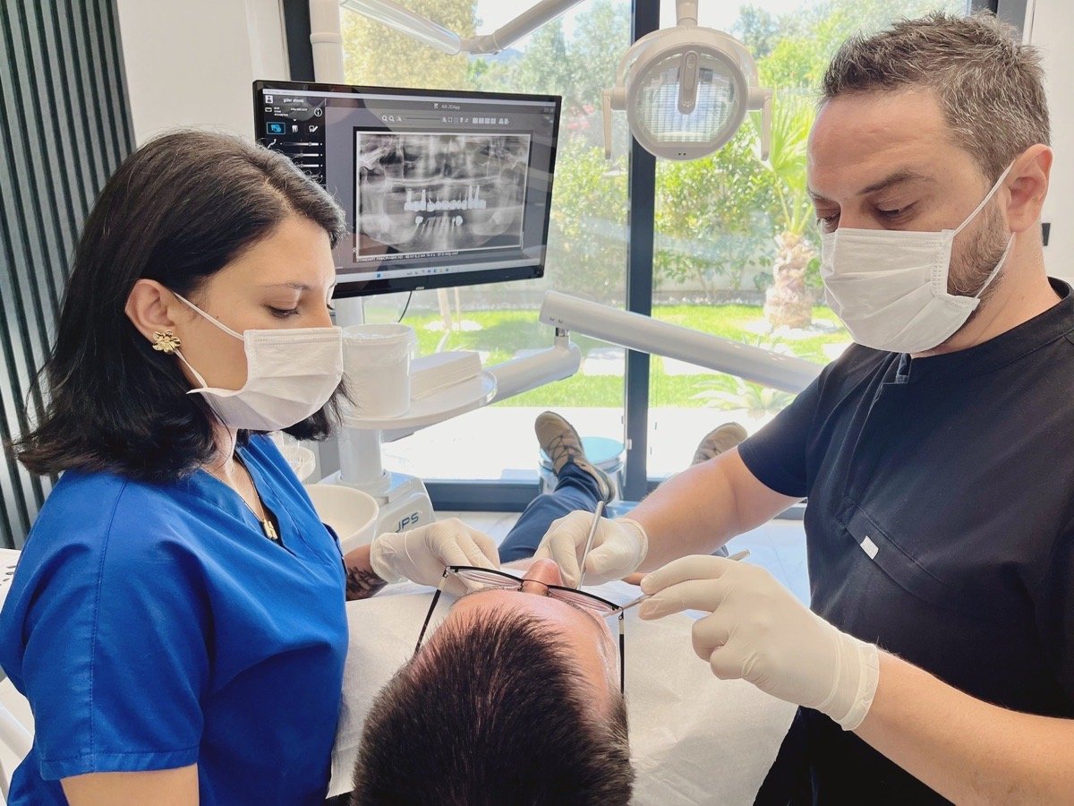 Dentists at work in the treatment room